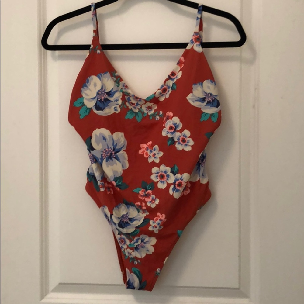Orange floral one piece swimsuit.